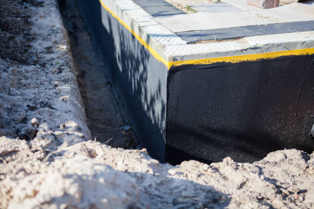 Professional Waterproofing technician working in Benton, KS
